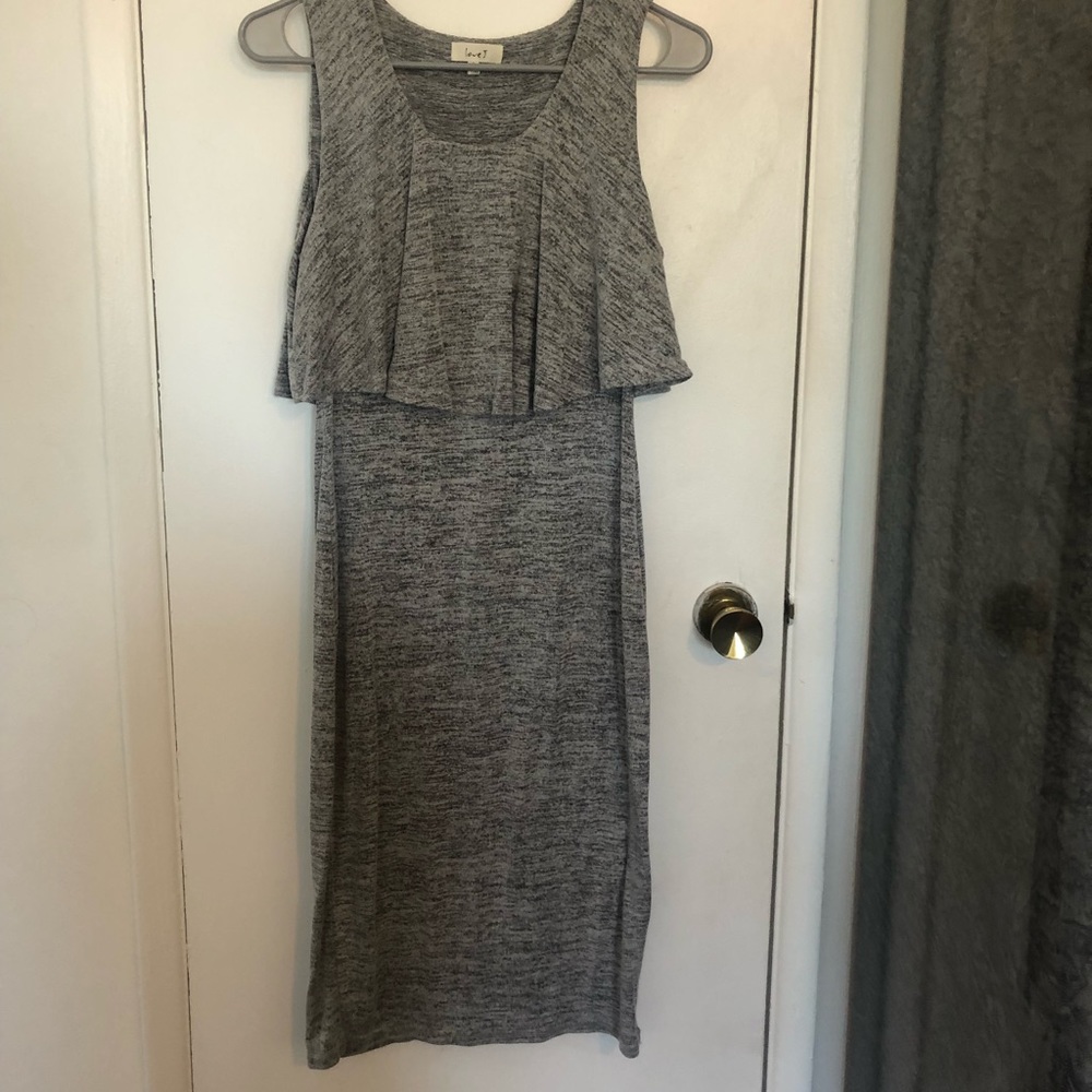 Gray sleeveless midi dress. Form fitting. Light material.  Good condition